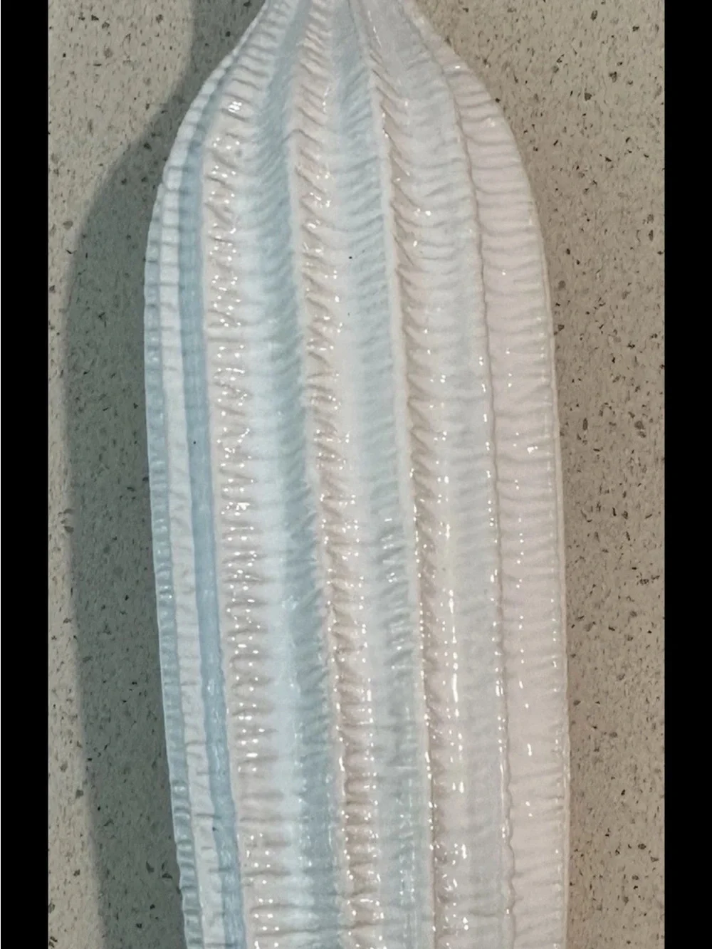 Striped white ceramic vase